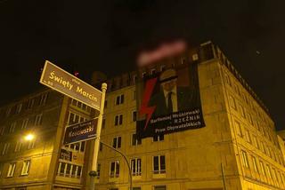 Baner z posłem PiS w centrum Poznania. Rzeźnik Praw Obywatelskich