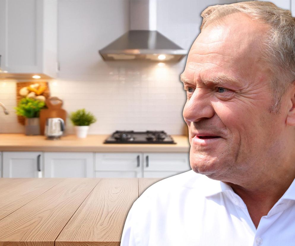 Portret Donalda Tuska na tle nowoczesnej kuchni, symbolizujący kontrowersje wokół darmowych mieszkań dla ministrów. Szczegóły dotyczące tej inicjatywy rządu Tuska znajdziesz na Super Biznes.