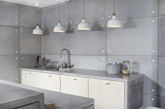 Beton architektoniczny w kuchni: dekoracja ścian, blaty i meble z betonu