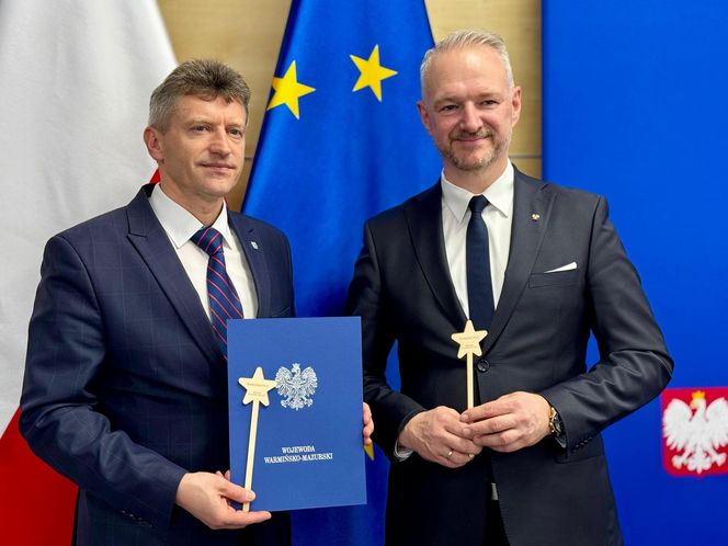 Wojewoda i różdżki.