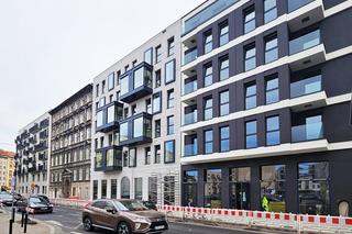 Nowa Kurkowa we Wrocławiu - zdjęcia elewacji i wnętrz budynku w trakcie prac wykończeniowych