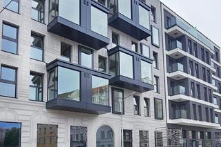 Nowa Kurkowa we Wrocławiu - zdjęcia elewacji i wnętrz budynku w trakcie prac wykończeniowych