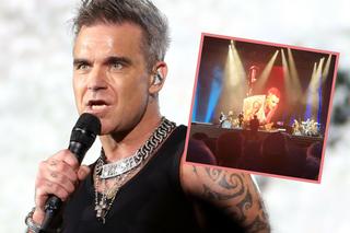 Robbie Williams po trzech piosenkach padł na kolana i przerwał koncert. To przez chorobę
