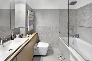 Szaro-biała łazienka w minimalistycznym stylu