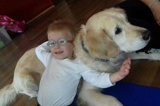 Olek Komar w czasie dogoterapii  w Osrodku dla Wyjatkowych Dzieci