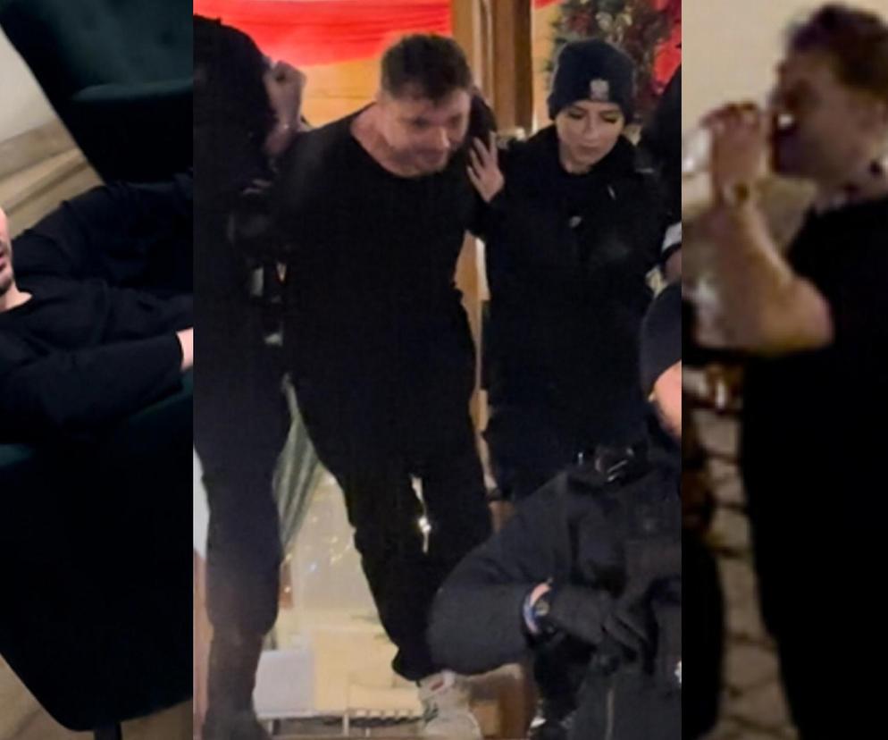 Daniel Martyniuk  skuty w kajdanki wyprowadzony z hotelu