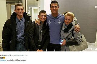 Cristiano Ronaldo spotkał się w Polsce z chłopcem, którego wybudził ze śpiączki [WIDEO i ZDJĘCIE]
