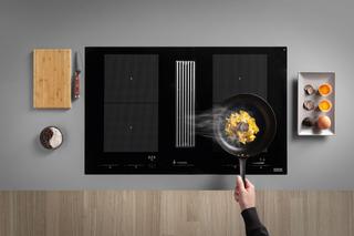 Płyta indukcyjna z okapem - nowoczesne urządzenie kuchenne typu 2w1