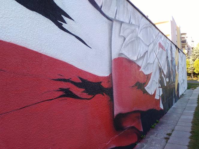 Nowy mural w Rzeszowie - orzeł w koronie, żołnierze i flaga na osiedlu Pobitno