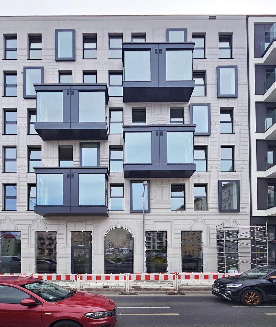 Nowa Kurkowa we Wrocławiu - zdjęcia elewacji i wnętrz budynku w trakcie prac wykończeniowych