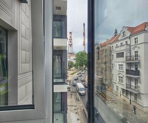 Nowa Kurkowa we Wrocławiu - zdjęcia elewacji i wnętrz budynku w trakcie prac wykończeniowych