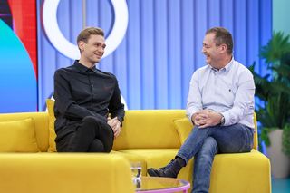 Jacek Rozenek z partnerką i synem na premierze filmu