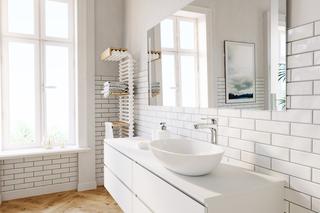 Jak kłaść płytki na ścianie w łazience - wysokość układania glazury? Radzi architekt