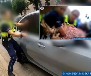 Wielka awantura na środku ulicy! Kilkoro policjantów otoczyło BMW. Ratunku, zostaw mnie! [WIDEO, ZDJĘCIA]