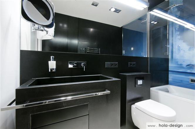 Minimalistyczny projekt wnętrz, czyli białe wnętrza z czarną łazienką