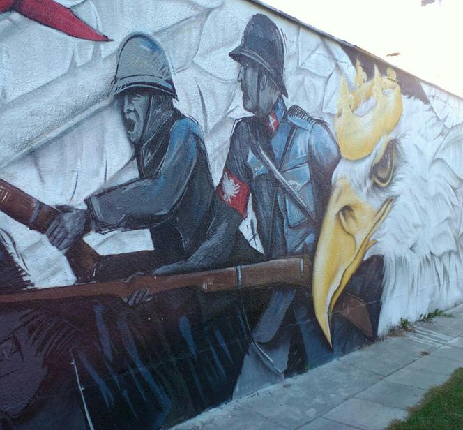 Nowy mural w Rzeszowie - orzeł w koronie, żołnierze i flaga na osiedlu Pobitno