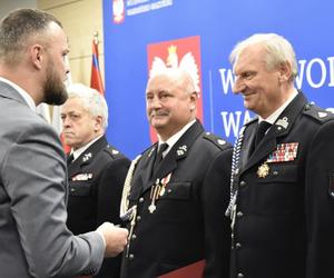 Wręczono odznaki Świętego Floriana i innne medale strażakom. Wśród zasłużonych wójt Gminy Iława