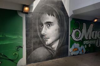 Mural z wizerunkiem Magika w przejściu podziemnym pod al. W. Roździeńskiego w Katowicach