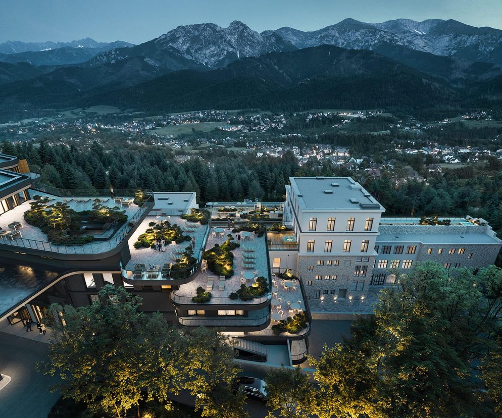 Wizualizacja luksusowego hotelu Salamandra w Kościelisku, prezentująca połączenie modernistycznej bryły z tarasami pełnymi zieleni, na tle gór i oświetlonej doliny o zmierzchu. Obiekt będzie najwyżej położonym luksusowym kompleksem wypoczynkowym w Polsce, o czym można przeczytać na Architektura Murator Plus.