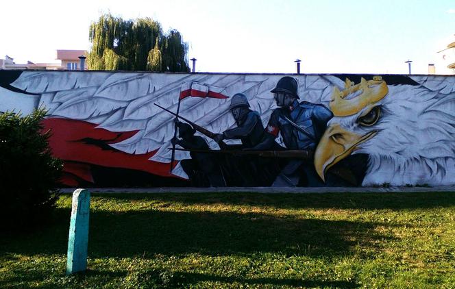 Nowy mural w Rzeszowie - orzeł w koronie, żołnierze i flaga na osiedlu Pobitno