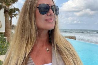 Hanna Lis z dzieckiem na kolanach