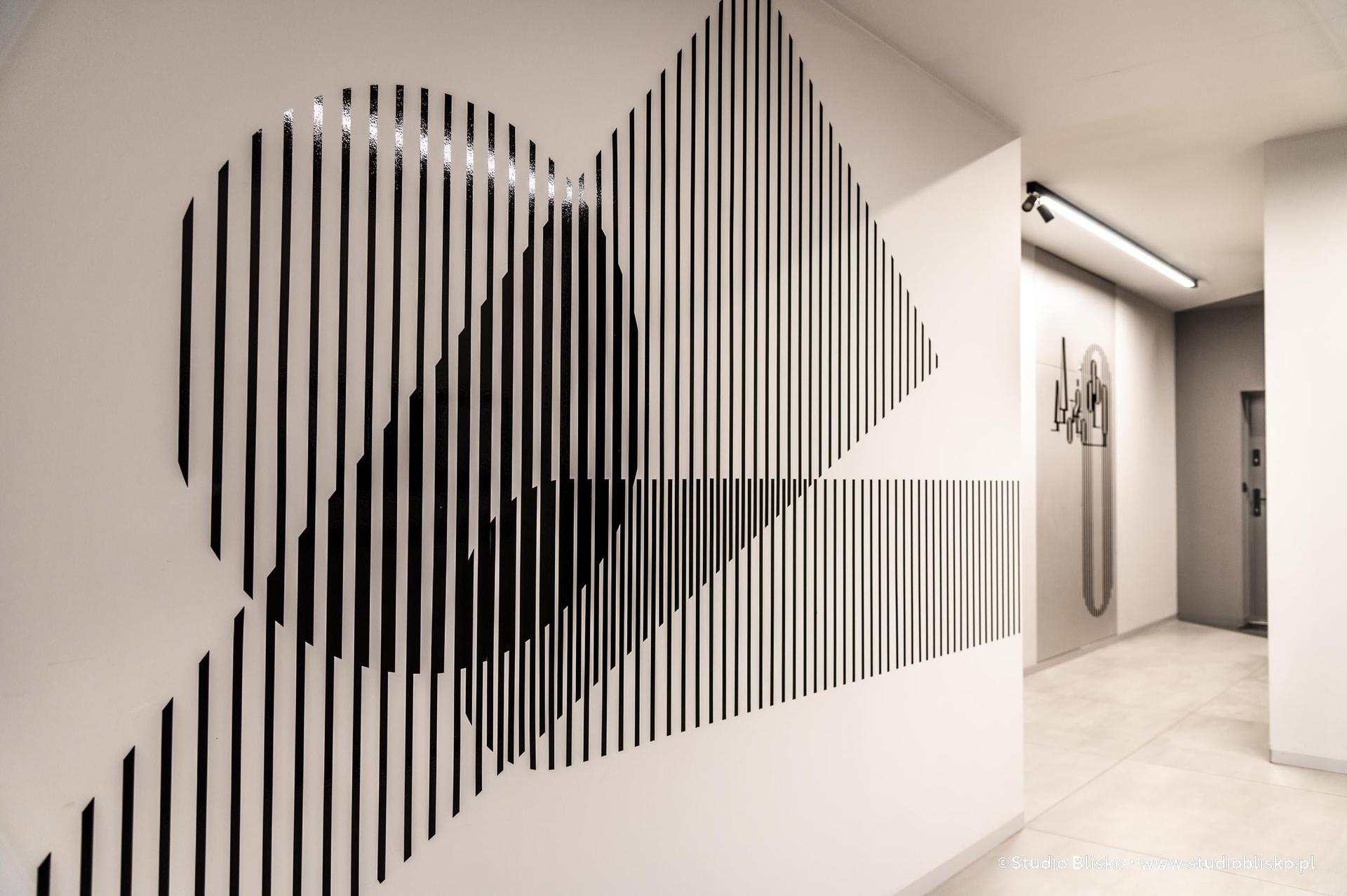 Wayfinding dla apartamentów Naturia w Toruniu 