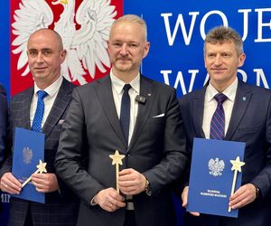 Wojewoda i różdżki.