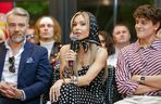 Oskar Cyms między Dodą a Roxie na konferencji Polsatu