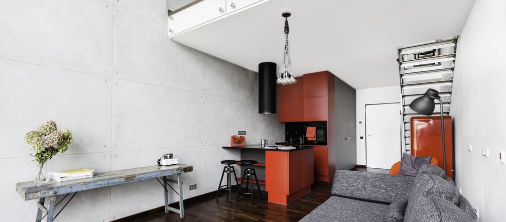 Loft w kolorach betonu i cegły
