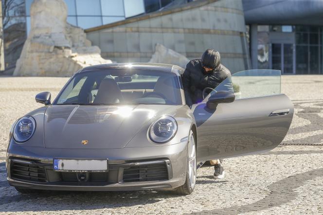 Tomasz Kammel jeździ Porsche 911 i limuzyną Audi A8 L