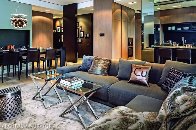 Lampy sufitowe, LED, halogeny? Jakie oświetlenie salonu polecają architekci