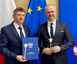 Wojewoda i różdżki.