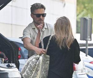 Agnieszka Kaczorowska i Marcin Rogacewicz z kijkiem wychodzą z treningu