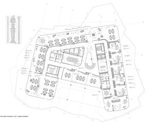 Brownfield - biurowiec na post-industrialnym terenie kopalni otoczonym przez sztuczne jeziora