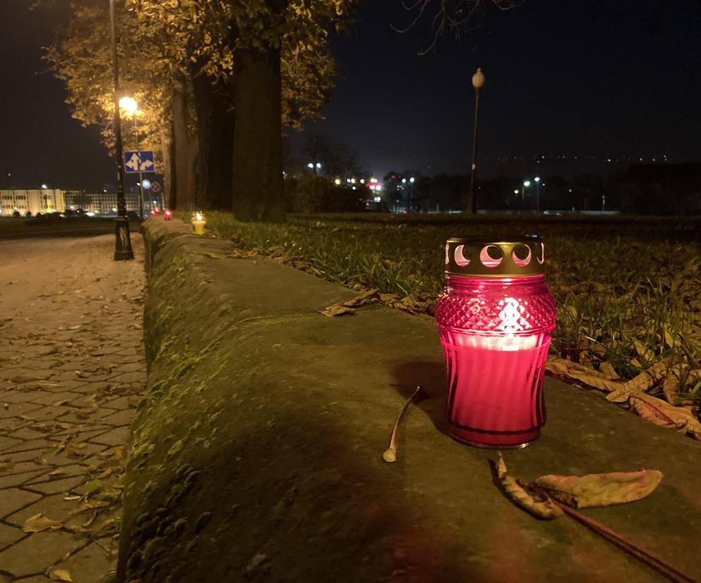 Znicz na murku dawnego cmentarza żydowskiego