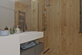 Aranżacja białej łazienki z drewnem