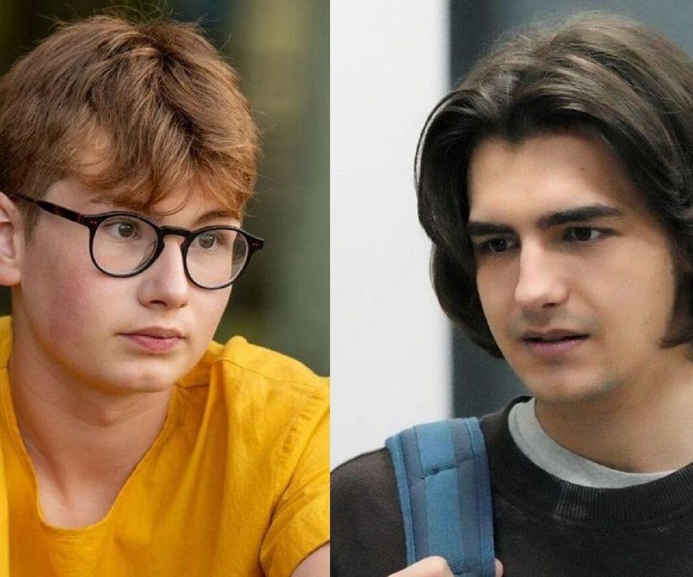 Uśmiechnięty Aleks (Hubert Wiatrowski) w okularach w żółtej koszulce obok Romea (Jacek Tyszkiewicz) z długimi włosami i plecakiem, to kadr z serialu „Barwy szczęścia”. O decyzji Aldony i dalszych losach bohaterów przeczytasz więcej na Super Seriale.