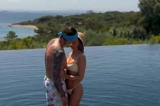 Zamrożona twarz Małgorzaty Rozenek całuje Radka Majdana