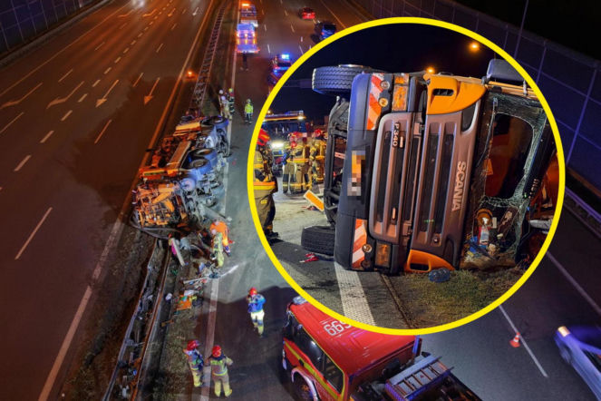 Groźnie na autostradzie pod Warszawą. Ciężarówka na boku po zderzeniu z BMW  