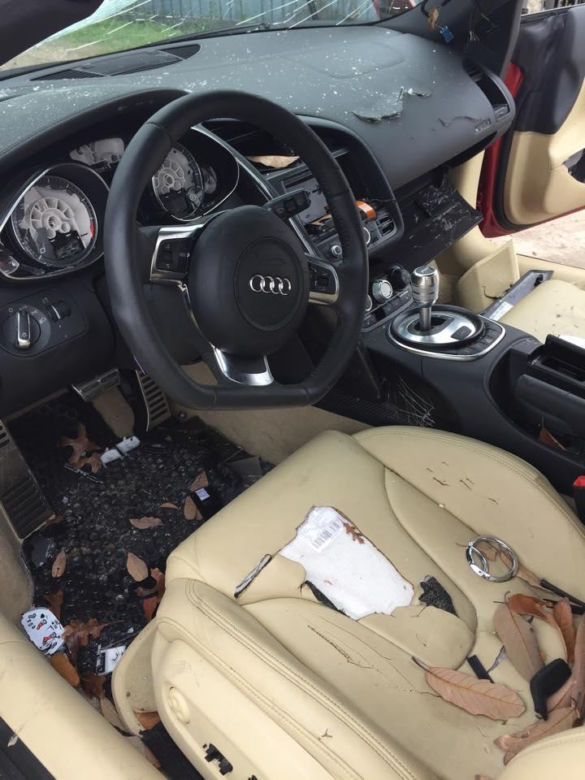 Zniszczone Audi R8 przez zranioną kobietę