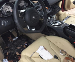 Zniszczone Audi R8 przez zranioną kobietę