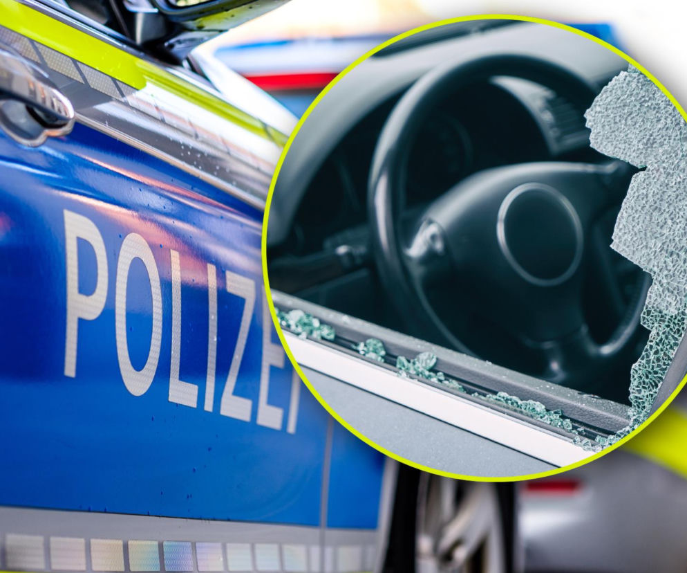 Niemiecki radiowóz policyjny z napisem POLIZEI na boku, a na pierwszym planie zbita szyba samochodowa z widoczną kierownicą. Widać kawałki szkła na ramie drzwi. Więcej o kradzieży Toyoty, o której mowa w artykule, przeczytasz na naszym portalu.