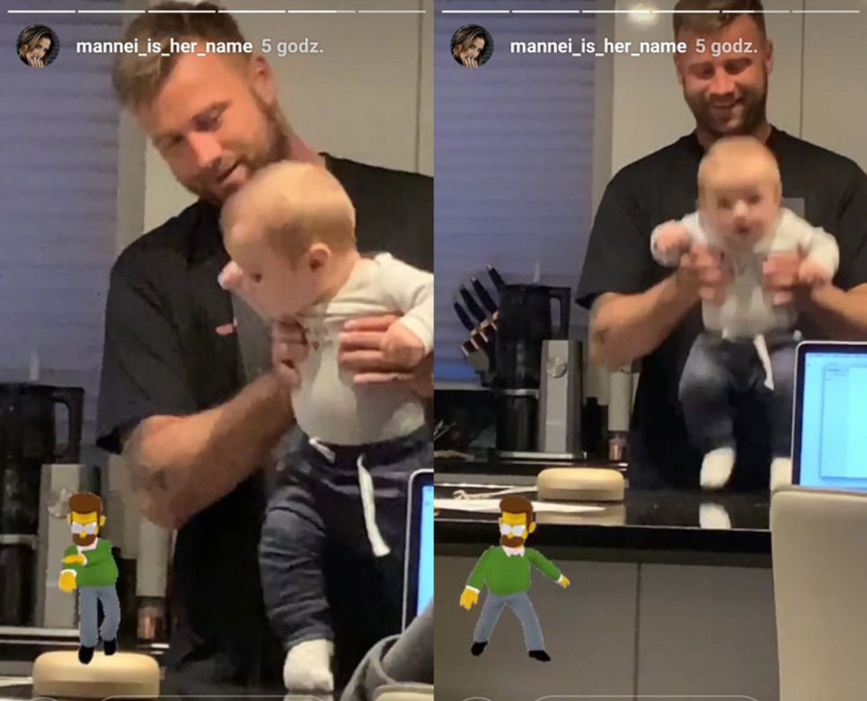 Artur Boruc trzyma synka na blacie kuchannym i porusza nim w takt muzyki