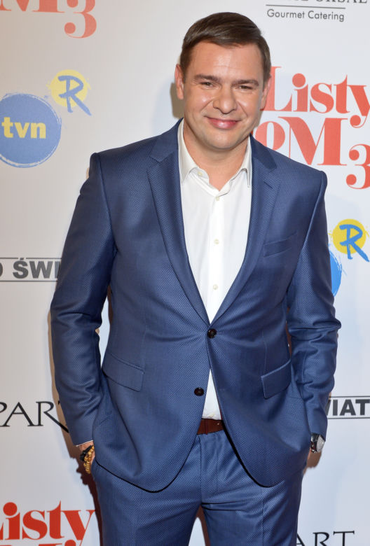 TOMASZ KAROLAK