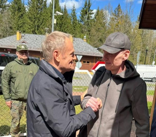 Andrzej Poczobut i Donald Tusk