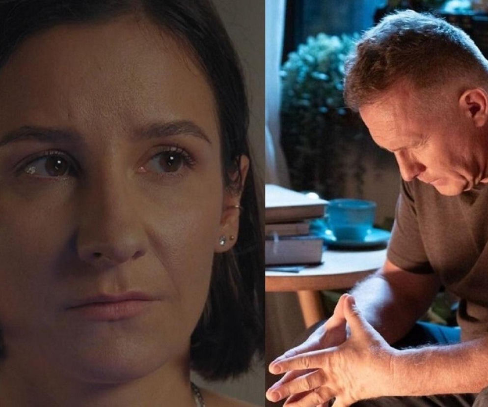 Bliskie ujęcie twarzy Agnes (Amanda Mincewicz) oraz Artura (Robert Moskwa) z serialu M jak miłość. Agnes, z krótkimi włosami i kolczykami, patrzy w prawo z zadumą. Artur w szarej koszulce siedzi ze spuszczoną głową, dłońmi splecionymi na kolanach. Scena emocjonalna, zapowiadająca kluczowe wyznania z artykułu na Super Seriale.