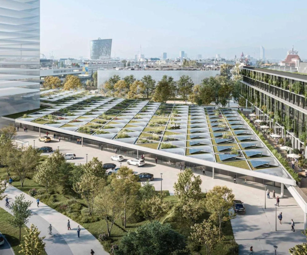 Wizualizacja nowoczesnego dworca autobusowego w Wiedniu z zielonym dachem, panelami słonecznymi i zintegrowanym hotelem Radisson RED, prezentująca innowacyjną architekturę miejską. Obiekt, łączący funkcjonalność z ekologią, będzie hubem transportowym Europy, o czym przeczytasz na Architektura Murator Plus.