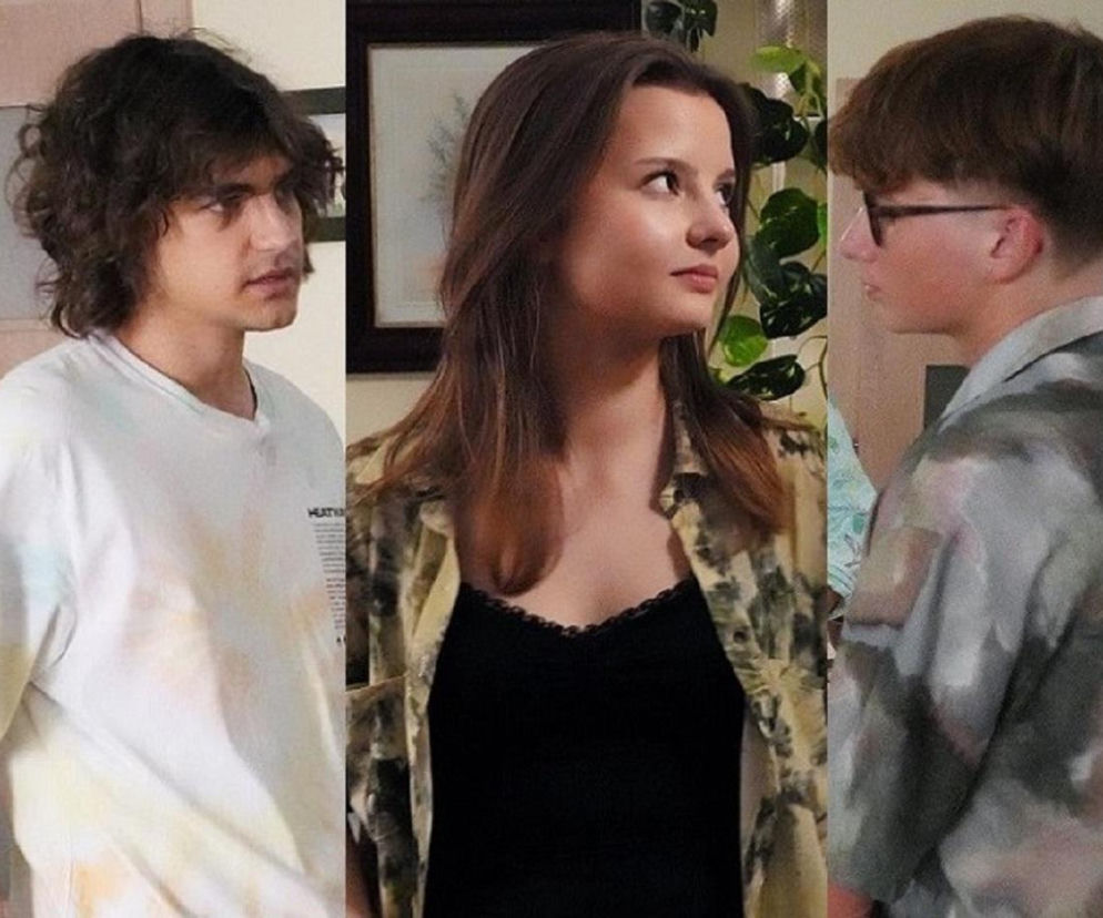 Romeo (Jacek Tyszkiewicz) po lewej, Ewa (Gabriela Ziembicka) w centrum i Aleks (Hubert Wiatrowski) po prawej, stojący w pomieszczeniu. Ewa patrzy w prawo na Aleksa, a on patrzy w lewo na nią. Romeo patrzy w prawo na Ewę. Scena z serialu „Barwy szczęścia”, o którym przeczytasz więcej na portalu Super Seriale.