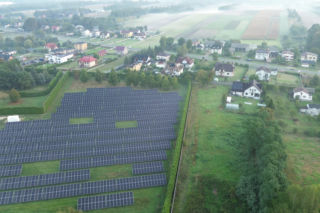 Solar panels absorbing sunlight for energy production - stock photo