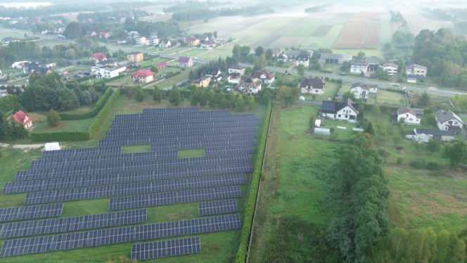 Solar panels absorbing sunlight for energy production - stock photo